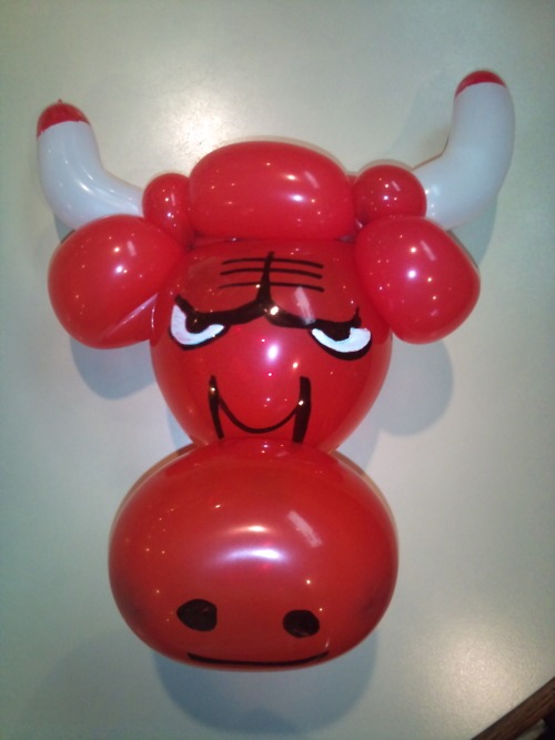 Chicago Bulls logo made out of balloon animals. Head is a balloon heart