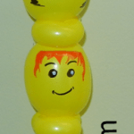Stacked lego heads made from twisting balloon by balloon artist Dale Obrochta